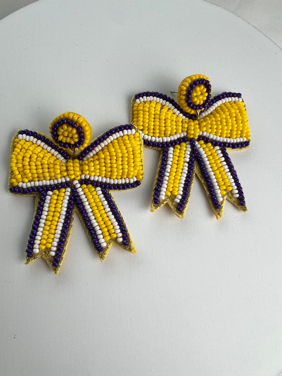 Bow earrings- purple and yellow gold