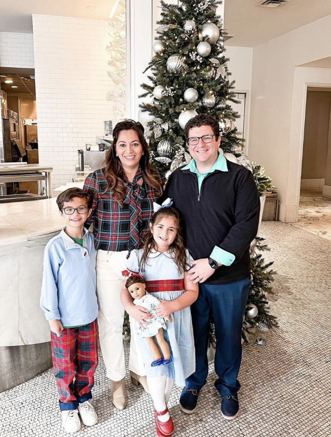  Owner and creator of Asdelia Mae Specialty Children's Clothing Boutique, Jenna Cauchi, and her family at Christmas time