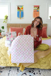 disco Santa Claus, pink checker print gift wrap